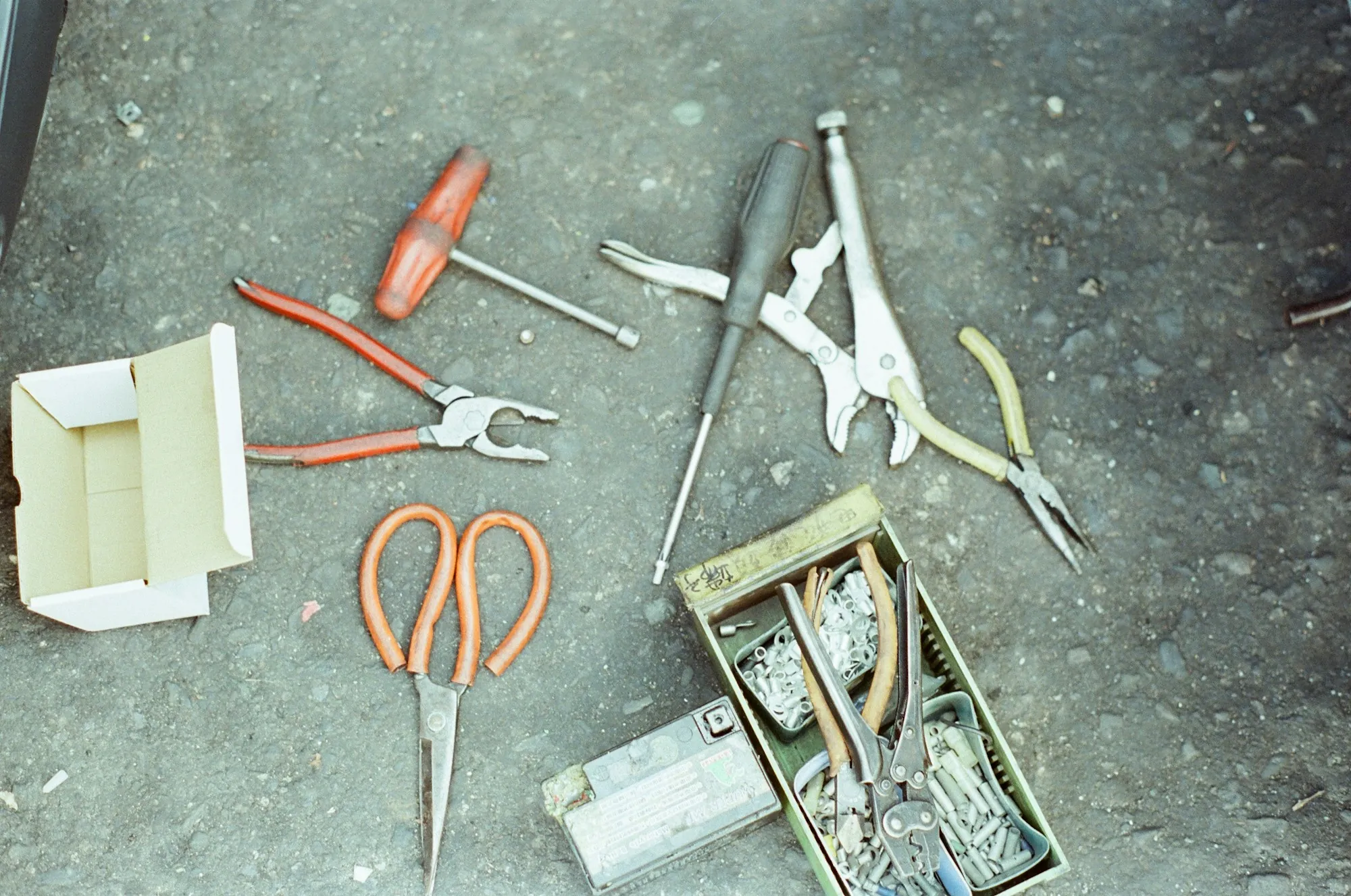 Electrician's pliers laid out on a work surface