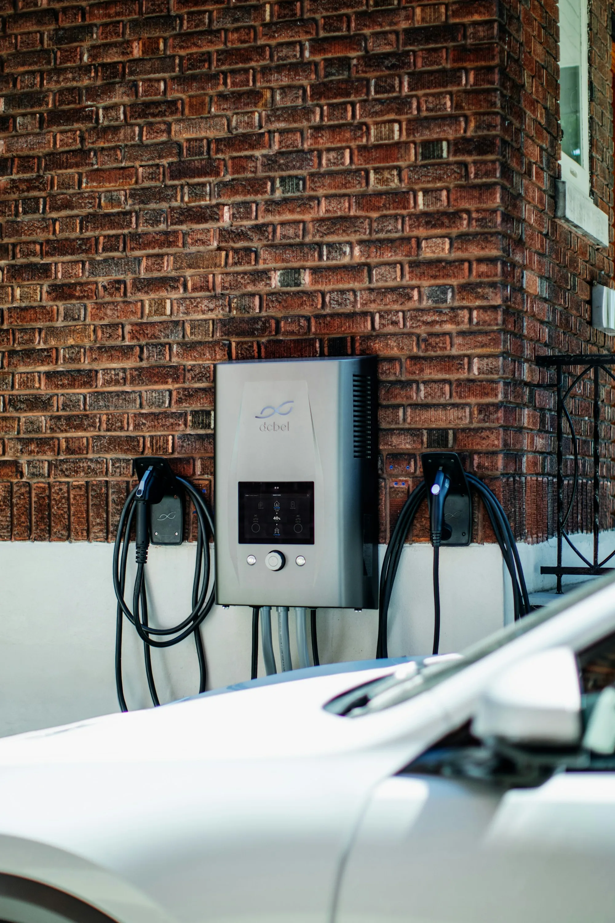 Electric car charger mounted on a wall