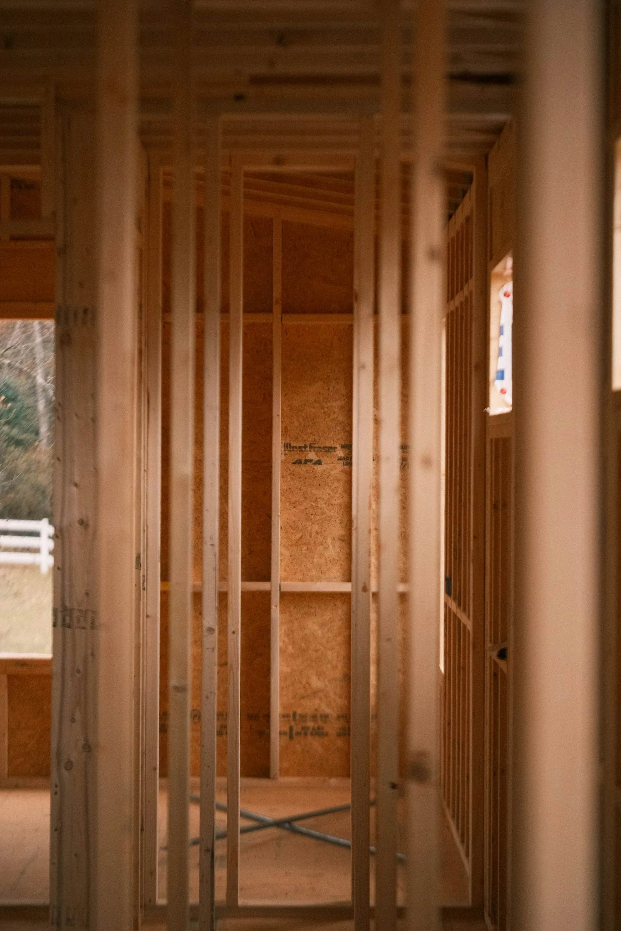 Wooden house frame under construction